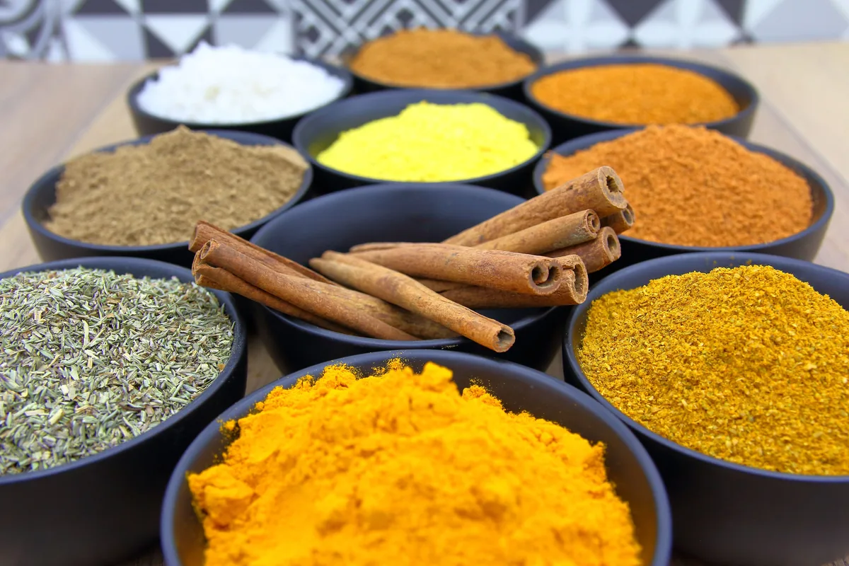 Bowls of coloured spices used in Cape Malay cooking